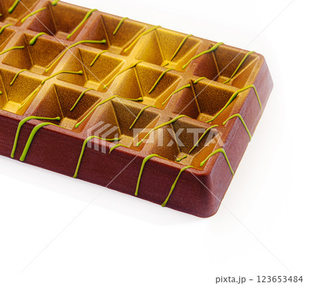 Colorful chocolate dessert with unique texture and design Colorful chocolate dessert with unique texture and design 123653484