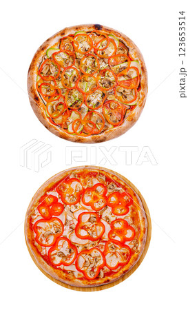 Delicious pizzas topped with fresh vegetables and herbs Delicious pizzas topped with fresh vegetables and herbs 123653514