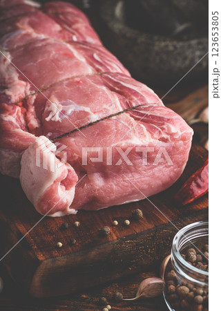 Rolled pork loin joint with different spices Rolled pork loin joint with different spices 123653805