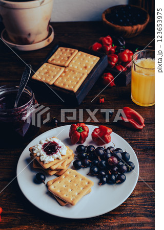 Crackers with Berry and Habanero Jam and Ricotta Crackers with Berry and Habanero Jam and Ricotta 123653975
