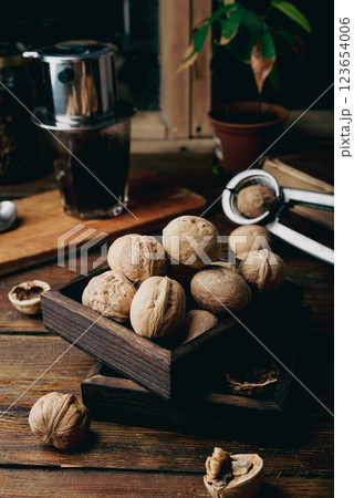 Walnuts in small wooden box 123654006