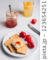 Habanero sauce with cream cheese on crackers 123654251