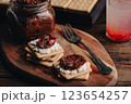 Crackers with homemade sundried tomato and cream cheese 123654257