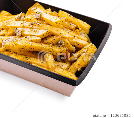 Crispy seasoned potato fries in a modern takeout container Crispy seasoned potato fries in a modern takeout container 123655086