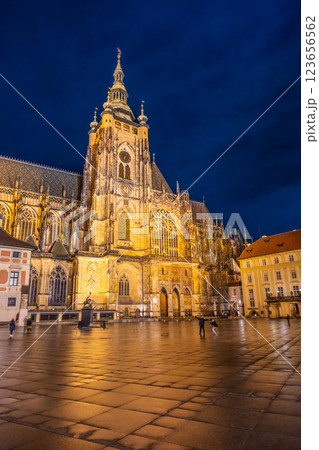 St Vitus Cathedral illuminates the night sky at Prague Castle, showcasing its stunning architecture and rich history. The surrounding area is quiet, enhancing the serene atmosphere. St Vitus Cathedral illuminates the night sky at Prague Castle, showcasing its stunning architecture and rich history. The surrounding area is quiet, enhancing the serene atmosphere. 123656562