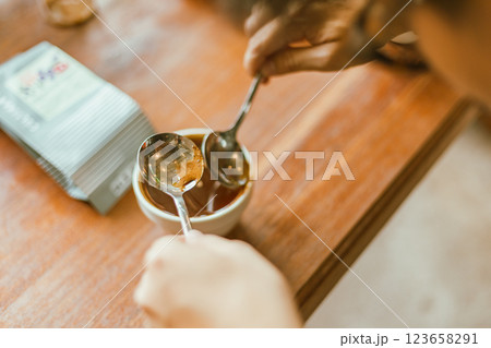 Barista preparing to test and inspecting the quality of coffee 123658291