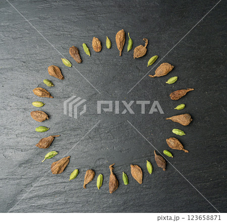 Black Cardamom Seeds Isolated, Brown Cardamon, Dry Kardamon Fruits, Cardamum Spice, Cardamomum Black Cardamom Seeds Isolated, Brown Cardamon, Dry Kardamon Fruits, Cardamum Spice, Cardamomum 123658871