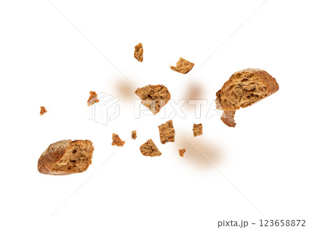 Broken wheat brown bread pieces isolated, fitness pumpkin carrot buns with seeds, cereal bread 123658872