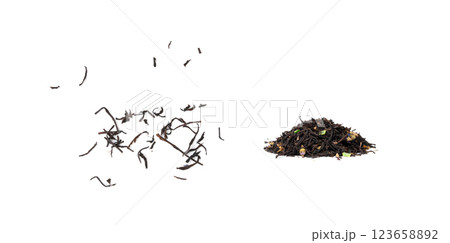 Flavored Black Tea Leaves Isolated, High Quality Black Tea Pile with Fruits and Flowers, Organic Indian Drink Flavored Black Tea Leaves Isolated, High Quality Black Tea Pile with Fruits and Flowers, Organic Indian Drink 123658892