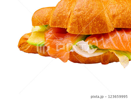 Fresh croissant sandwich with salmon and vegetables on display 123659995