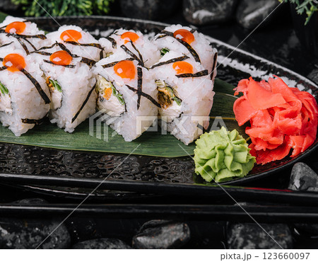 Delicious sushi platter with fresh ingredients Delicious sushi platter with fresh ingredients 123660097