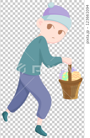 A young boy holding a basket full of Easter eggs A young boy holding a basket full of Easter eggs 123661094