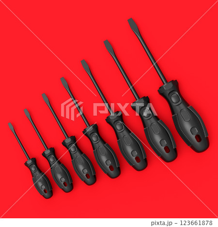 Set of black and monochrome screwdriver on red background Set of black and monochrome screwdriver on red background 123661878