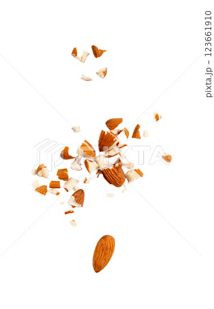 Crushed almonds isolated, nut pieces, sliced scattered almond seeds and cut kernels collection on white background 123661910