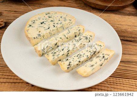 Fourme cheese, stinky french cheese, Fourme d'Ambert gourmet food, semi-hard blue cheese Fourme cheese, stinky french cheese, Fourme d'Ambert gourmet food, semi-hard blue cheese 123661942