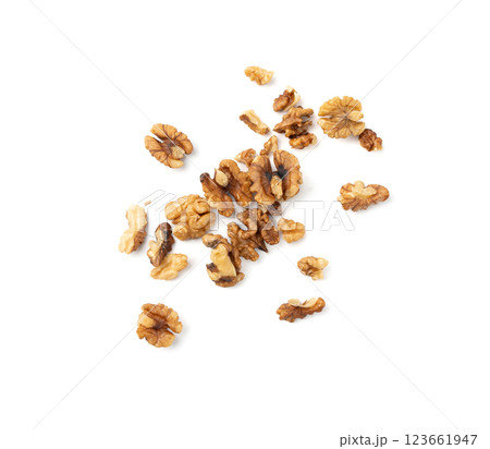 Chopped wallnut , broken roasted walnuts powder, heap of nuts crumbs, whole kernel pieces Chopped wallnut , broken roasted walnuts powder, heap of nuts crumbs, whole kernel pieces 123661947