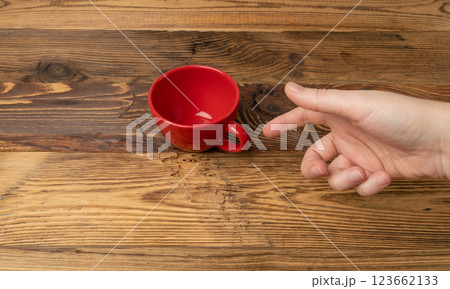 Hand Holds Cup, Empty Red Cup in Hands, Coffee Mug, Teacup, Hot Beverage Mockup 123662133