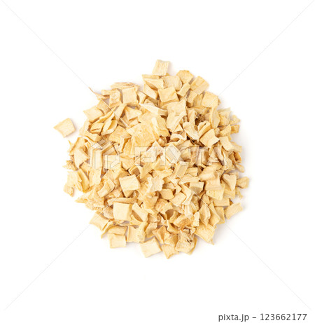 Dry parsley root, dried diced celery cubes, scattered small liquorice pileces, dry vegetable 123662177
