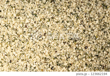 Shelled hemp seeds pile, peeled cannabis grains, marijuana kernels without peel 123662194
