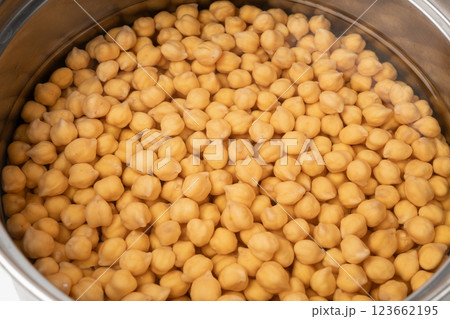 Soaked chickpeas, chick pea in water, swollen wet Cicer arietinum fruits, garbanzo beans cooking 123662195