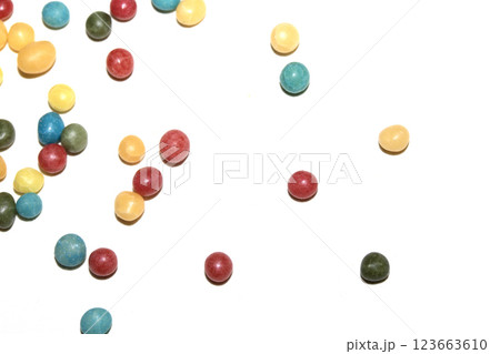 Close up of round ball sugar ice cream cake decorations on a white background 123663610
