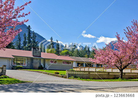 Family residential house on snow mountain and blue sky background Family residential house on snow mountain and blue sky background 123663668