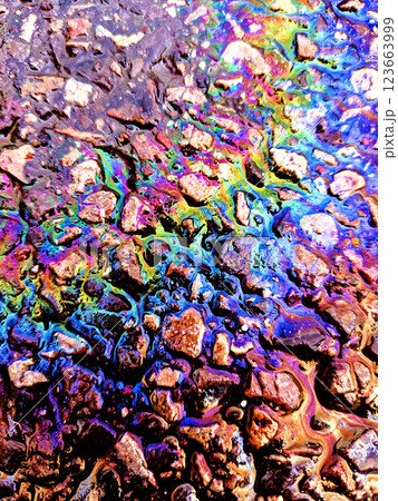 Oil Petrol Pollution Metallic Rainbow Gasoline Leak on Pavement Oil Petrol Pollution Metallic Rainbow Gasoline Leak on Pavement 123663999