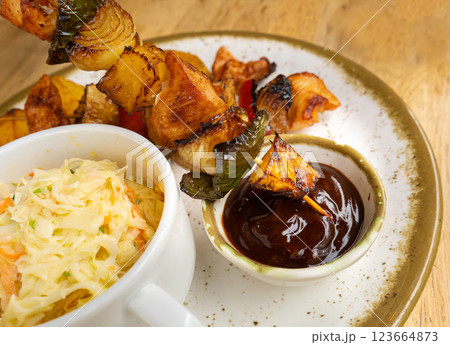 Poultry Shish Kebab, Barbecue Shashlik with Meat and Vegetables, Fruits, Peppers, Onions and Pineapple 123664873