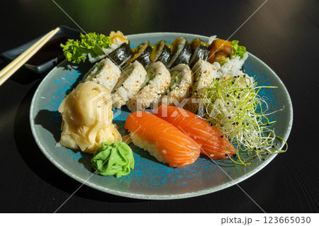 Sushi Plate, Fish Maki Rolls, Japan Seafood, Sushi Set, Asian Dinner, Tradition Nigiri Susi Sushi Plate, Fish Maki Rolls, Japan Seafood, Sushi Set, Asian Dinner, Tradition Nigiri Susi 123665030