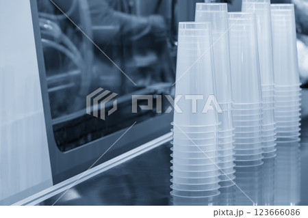 The plastic drinking glass part on the  conveyer belt. 123666086