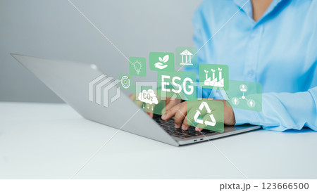 ESG environmental social governance investment business concept, Businessman using laptop to analyze ESG on screen in business investment strategy concept, Environmental and business growth together. ESG environmental social governance investment business concept, Businessman using laptop to analyze ESG on screen in business investment strategy concept, Environmental and business growth together. 123666500