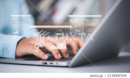 An analyst use a computer and dashboard for data business analysis and Management System with KPI metrics to the database for technology, Financial data analytics, Accounting record documents online. An analyst use a computer and dashboard for data business analysis and Management System with KPI metrics to the database for technology, Financial data analytics, Accounting record documents online. 123666504