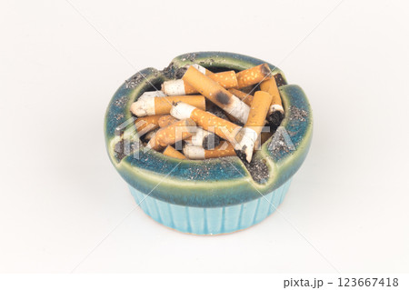 Ashtray butts cigarette on white Ashtray butts cigarette on white 123667418
