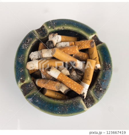 Ashtray butts cigarette on white Ashtray butts cigarette on white 123667419