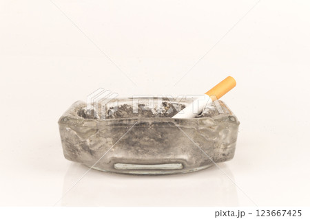 Ashtray butts cigarette on white Ashtray butts cigarette on white 123667425