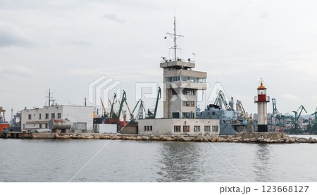 Varna, Bulgaria. Coastal view featuring a dockside with industrial buildings Varna, Bulgaria. Coastal view featuring a dockside with industrial buildings 123668127