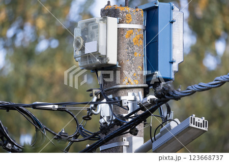 A detailed view of outdoor electronic equipment and cables 123668737