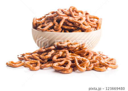 Heart shaped pretzel in bowl  isolated on white background. 123669480