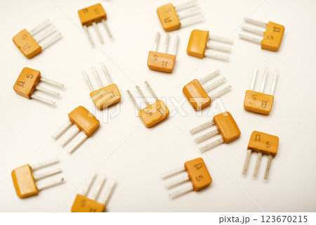 Old transistors on a white background. Electronic elements. Old transistors on a white background. Electronic elements. 123670215