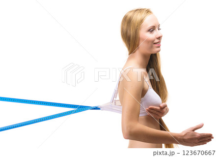 Woman wearing too big bra, loose band Woman wearing too big bra, loose band 123670667