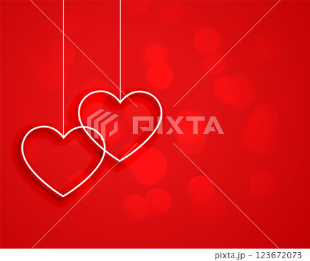 minimal style hanging hearts on red background 123672073