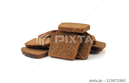 Black rye bread isolated, dark brown sliced loaf, sourdough borodinsky rugbrod square slices 123672862