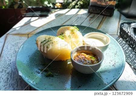 Lithuanian potato dumplings, cepelinai pancakes or kolduny, meat stuffed draniki, traditional didzkukuliai Lithuanian potato dumplings, cepelinai pancakes or kolduny, meat stuffed draniki, traditional didzkukuliai 123672909