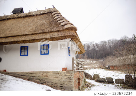 Traditional Thatched House in Ukraine Traditional Thatched House in Ukraine 123673234