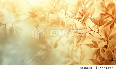 Tranquil image of golden autumn leaves with a gentle bokeh effect 123674367