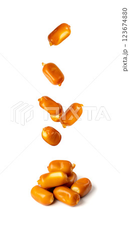 Flying Smoked Mozzarella Cheese Isolated, Falling Traditional Polish Oscypek, Slovak Mountain Snack Flying Smoked Mozzarella Cheese Isolated, Falling Traditional Polish Oscypek, Slovak Mountain Snack 123674880