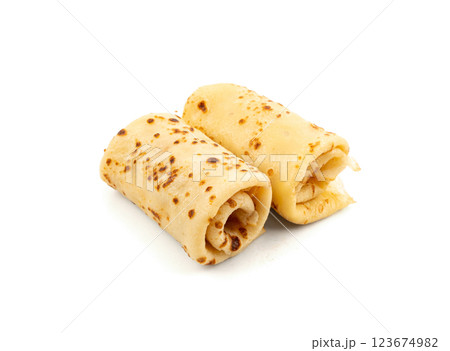 Stuffed pancakes, Eastern European rolled crepe, pancakes filled with meat, thin blini, stuffed rolls pile Stuffed pancakes, Eastern European rolled crepe, pancakes filled with meat, thin blini, stuffed rolls pile 123674982