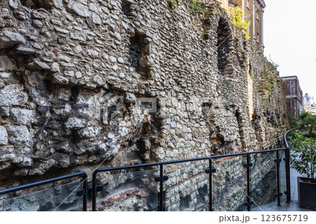 Ancient Roman and Medieval London city wall with historic stone architecture Ancient Roman and Medieval London city wall with historic stone architecture 123675719