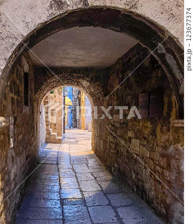 Magical old stone tunnels in the streets of Split, Croatia Magical old stone tunnels in the streets of Split, Croatia 123677374