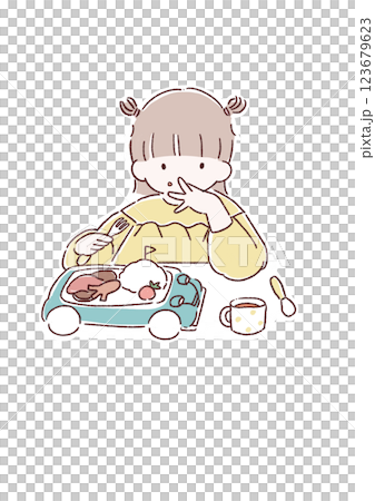 A child licking his fingers while eating a children's lunch 123679623